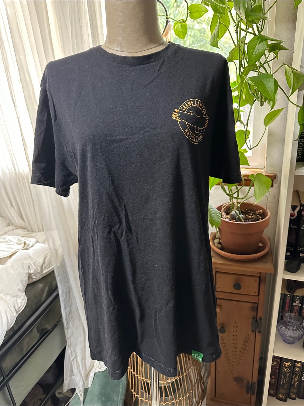Black Short Sleeve Graphic Tee with Gold Crest - Unbranded